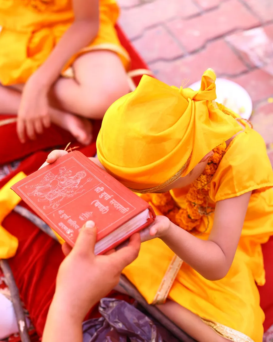 A young girl dressed for Kanya Pujan